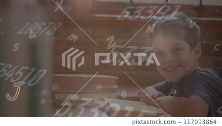Image of multiple alphabets and numbers floating over caucasian boy smiling in class at school Image of multiple alphabets and numbers floating over caucasian boy smiling in class at school 117013864