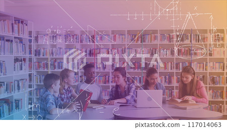 Image of math formulas over diverse pupils using laptops 117014063