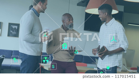 Image of ecology icons over diverse colleagues using laptop and discussing work in office 117015451