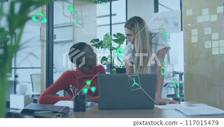Image of ecology icons over diverse colleagues using laptop and discussing work in office Image of ecology icons over diverse colleagues using laptop and discussing work in office 117015479