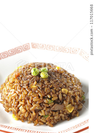 Burnt soy sauce fried rice photographed on a white background Burnt soy sauce fried rice photographed on a white background 117015668