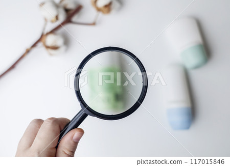 Choice of deodorant or antiperspirant. Looking at the jars on the table. Safe or critical deodorant ingredients Choice of deodorant or antiperspirant. Looking at the jars on the table. Safe or critical deodorant ingredients 117015846