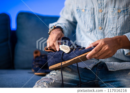 Cleaning the suede shoes. Cleaning the suede shoes. 117016216