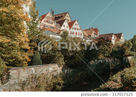 Old national German town house in Bietigheim-Bissingen, Baden-Wuerttemberg, Germany, Europe. Old Town is full of colorful and well preserved buildings. Old national German town house in Bietigheim-Bissingen, Baden-Wuerttemberg, Germany, Europe. Old Town is full of colorful and well preserved buildings. 117017125