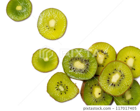 Round kiwi slices on a white background. The concept of juicy ripe fruit. Place for an inscription. Mockup. raw food diet. Ingredient for many dishes. Southern fruit. R 117017405