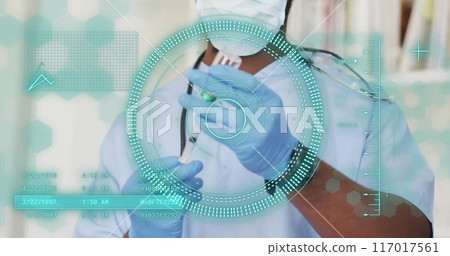 Image of scope scanning and data processing over african american male doctor in hospital 117017561