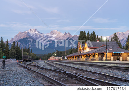 Banff, Alberta, Canada - SEP 08 2020 : Banff Railway Station in summer evening. Banff National Park, Canadian Rockies. Banff, Alberta, Canada - SEP 08 2020 : Banff Railway Station in summer evening. Banff National Park, Canadian Rockies. 117017684