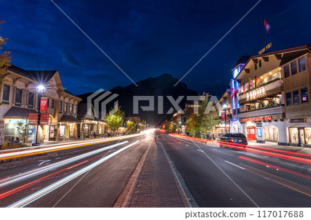 Banff, Alberta, Canada - SEP 07 2020 : Banff Avenue street view in summer night. Banff National Park, Canadian Rockies. Banff, Alberta, Canada - SEP 07 2020 : Banff Avenue street view in summer night. Banff National Park, Canadian Rockies. 117017688
