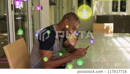 Using smartphone and smiling, man surrounded by social media notifications image Using smartphone and smiling, man surrounded by social media notifications image 117017716