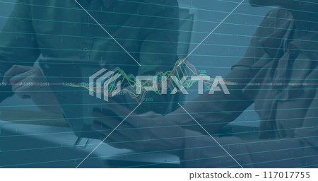 Analyzing financial data image over business professionals working on tablet 117017755