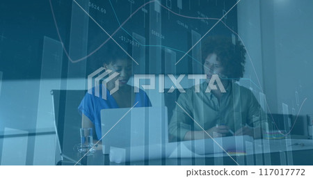 Financial data charts image over business meeting with two people discussing 117017772
