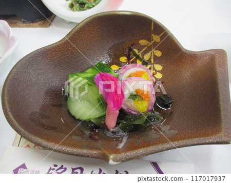 Vinegared cucumber appetizer served at dinner at a hot spring inn 117017937