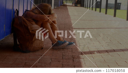Image of moving background over sad caucasian schoolboy at school 117018058