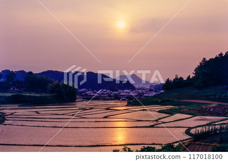 Ektachrome to digital. Rice terraces and sunset in Obara, Asuka Village. Mount Nijo, Mount Unebi, and Mount Amakashi. 1993. Ektachrome to digital. Rice terraces and sunset in Obara, Asuka Village. Mount Nijo, Mount Unebi, and Mount Amakashi. 1993. 117018100