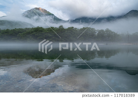 Taisho Pond and Mount Yakedake shrouded in mist, Kamikochi Taisho Pond and Mount Yakedake shrouded in mist, Kamikochi 117018389