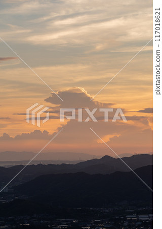 Sunset and mountain silhouette Sunset and mountain silhouette 117018621