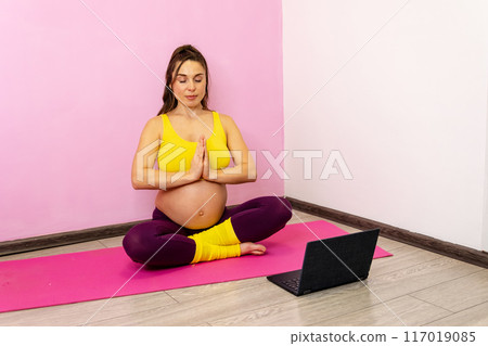 The laptop suggests a modern approach to health, the trend of digital wellness 117019085