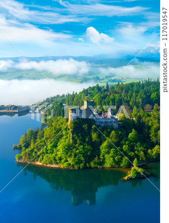 Panoramic view of castle in Niedzica by lake Czorsztyn, Poland Panoramic view of castle in Niedzica by lake Czorsztyn, Poland 117019547