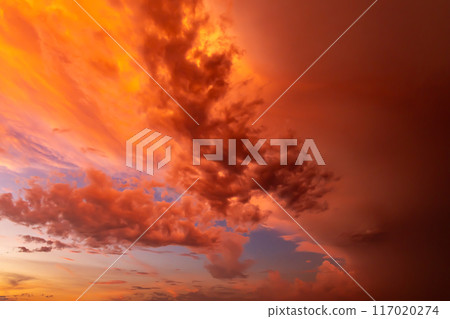 Sunset sky after a thunderstorm Wide angle Warm color Sunset sky after a thunderstorm Wide angle Warm color 117020274