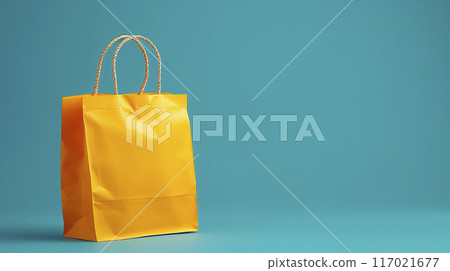 A yellow shopping bag is on a blue background 117021677