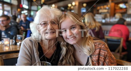 portrait of a grandmother and her teen granddaughter 117022288