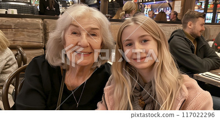 portrait of a grandmother and her teen granddaughter 117022296
