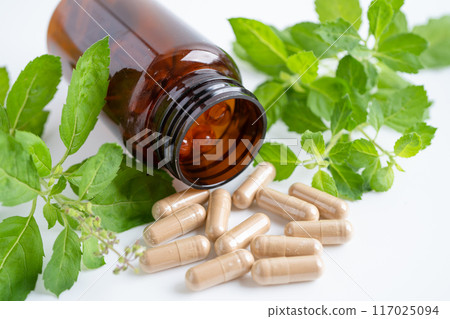 Alternative medicine herbal organic capsule, mineral, drug with herbs leaf natural supplements for healthy good life. Alternative medicine herbal organic capsule, mineral, drug with herbs leaf natural supplements for healthy good life. 117025094