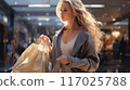 Beautiful woman enjoying shopping 117025788