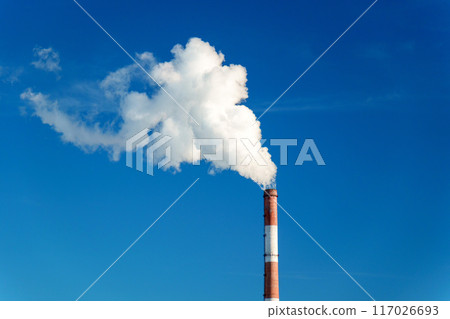 Smokestack emits thick creating a striking visual image of industrial pollution. 117026693
