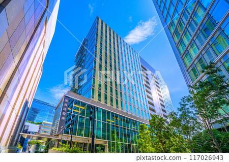 Tokyo cityscape in August, Japan. View of Shibuya Ward Office and Park Court Shibuya The Tower in Udagawacho. (1st) Tokyo cityscape in August, Japan. View of Shibuya Ward Office and Park Court Shibuya The Tower in Udagawacho. (1st) 117026943