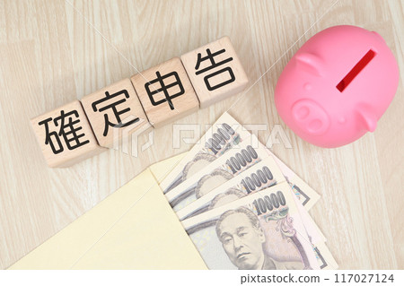 Tax return and piggy bank 117027124