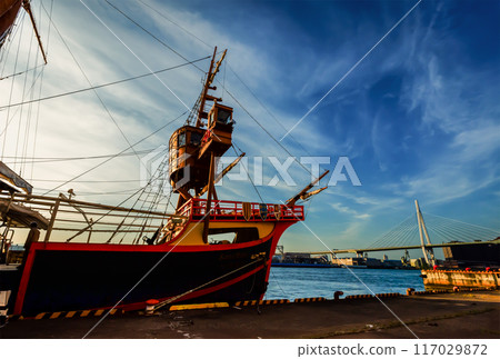 A sailing ship docked at the West Wharf of Osaka Port and the evening view, May 17, Japan 117029872