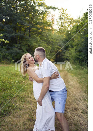 a 30-year-old couple in love in the garden 117030056