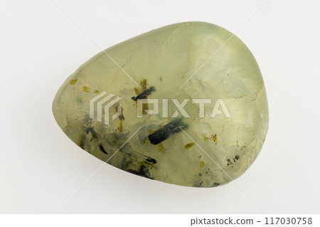 natural green prehnite gem on the white background natural green prehnite gem on the white background 117030758
