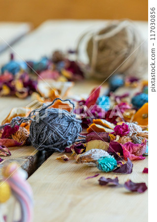 Close-up roll of blue yarn for crafting 117030856