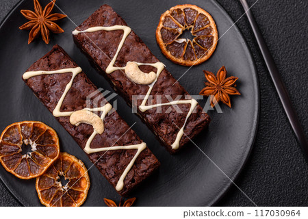 Delicious sweet brownies with chocolate and nuts 117030964