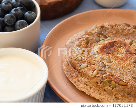 Homemade protein keto bread for breakfast, closeup Homemade protein keto bread for breakfast, closeup 117031178