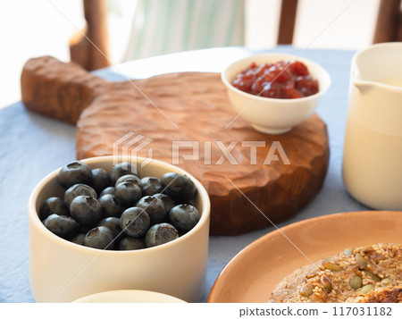 Sweet breakfast served outdoors with homemade food Sweet breakfast served outdoors with homemade food 117031182