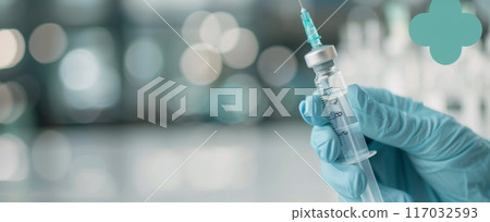 Medical Professional Holding Syringe in Clinical Setting During Daytime 117032593