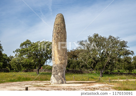 The Standing Stone, Menhir of Meada at Castelo de Vide, Portugal. The largest of the Iberian Peninsula. The Standing Stone, Menhir of Meada at Castelo de Vide, Portugal. The largest of the Iberian Peninsula. 117033091