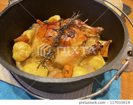 Dutch oven Christmas chicken 117033619