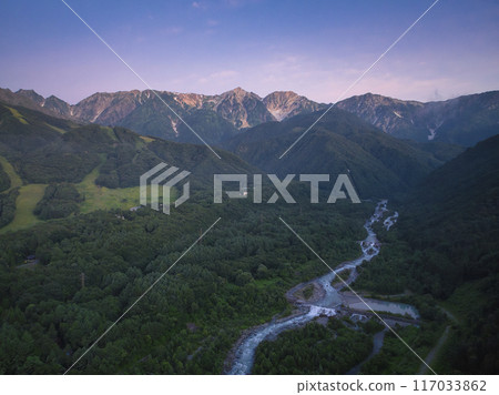 Before sunrise in midsummer, the beautiful Hakuba Sanzan mountains, Hakuba Village, Nagano Prefecture (aerial photography by drone) 117033862