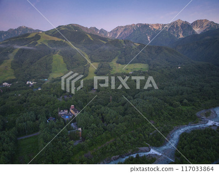 Before sunrise in midsummer, the beautiful Hakuba mountain range, Hakuba Village, Nagano Prefecture (aerial photography by drone) Before sunrise in midsummer, the beautiful Hakuba mountain range, Hakuba Village, Nagano Prefecture (aerial photography by drone) 117033864
