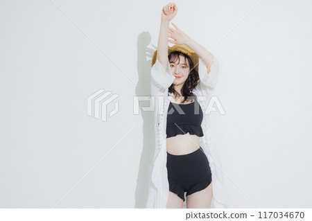 Young woman at summer resort 117034670