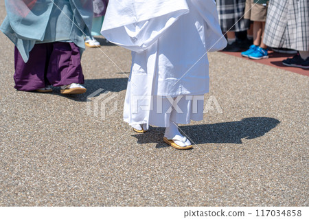 A procession of Saio women and spectators at the Saio Festival held in Meiwa Town, Mie Prefecture A procession of Saio women and spectators at the Saio Festival held in Meiwa Town, Mie Prefecture 117034858