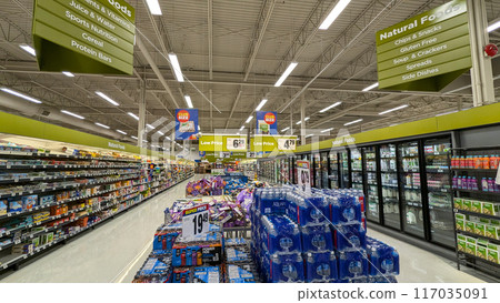 Display nature food corridor at Superstore; interior of supermarket full of grocery items Display nature food corridor at Superstore; interior of supermarket full of grocery items 117035091