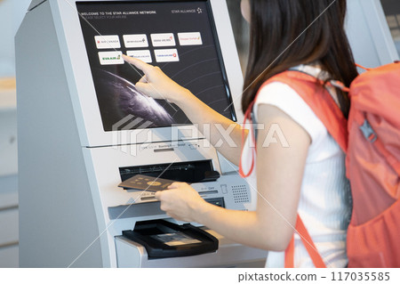 Airport check-in female Airport check-in female 117035585