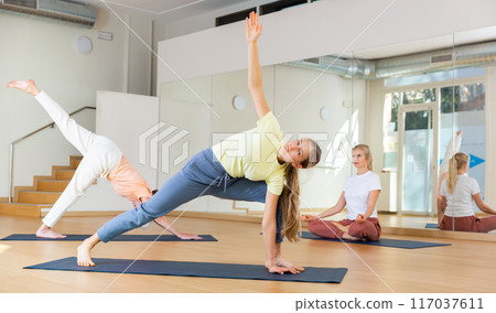 School girl training stretching workout School girl training stretching workout 117037611