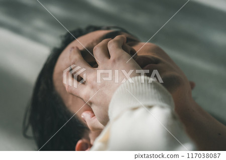 A despairing man 117038087