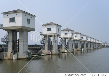 Hachirogata Floodgate, located on the border between the Sea of Japan and Hachirogata 117041387